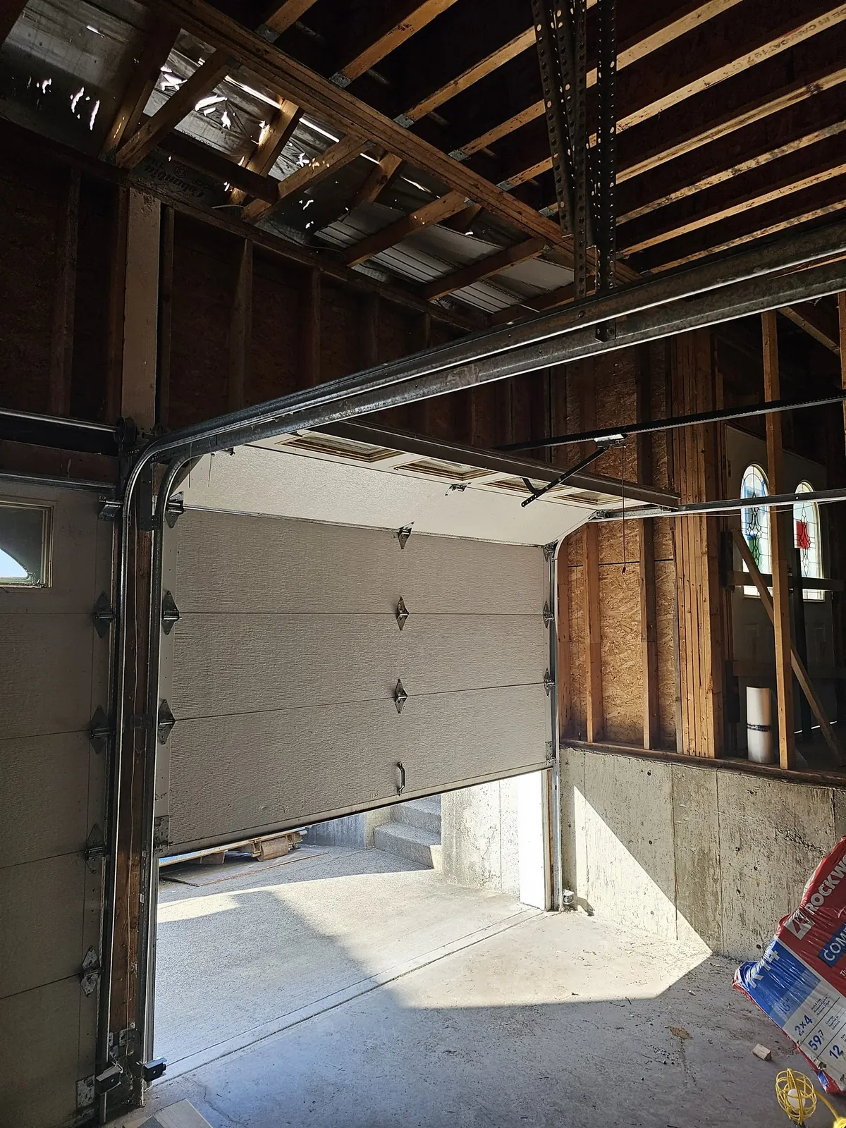 New garage door installed from inside a Beach Grove, Tsawwassen garage